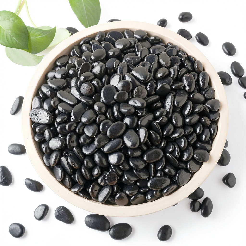 Mulctun black river rocks in a garden planter